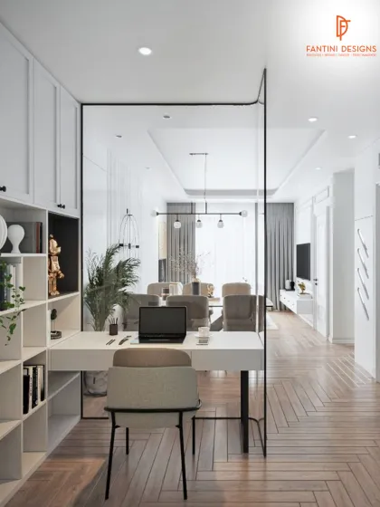 A glass partition separates the home office from the main living area without blocking light, maintaining an open and airy feel. The herringbone wood floor adds warmth.