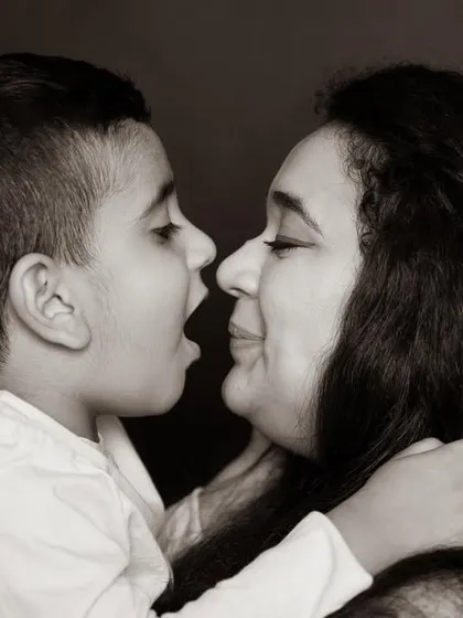 The little moments, like an Eskimo kiss between mother and son, are what make life worthwhile. These close-up, intimate portraits are my favorite way to show the depth of your family's love.