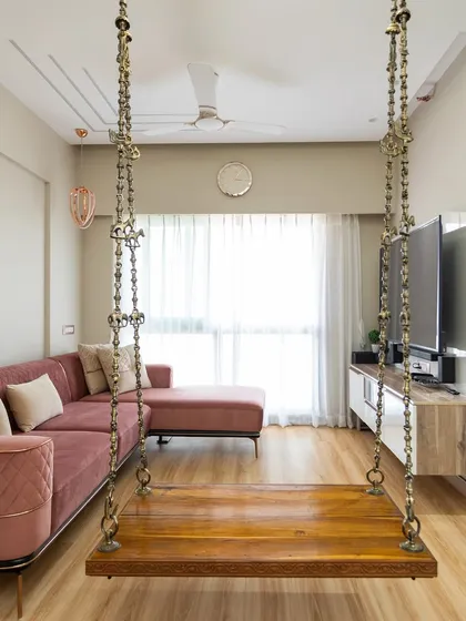 Nothing adds a touch of tradition and comfort to a modern living room like a handcrafted wooden swing. It’s the perfect spot for your morning chai or evening relaxation, and a feature I love incorporating to make a house feel like a home.