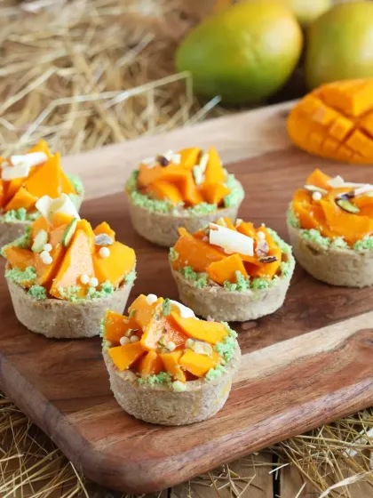 I celebrate mango season with these delightful mango tarts. Each tart has a crisp base filled with a light pistachio cream and topped with fresh, sweet mango chunks. It’s the taste of summer in every single bite.