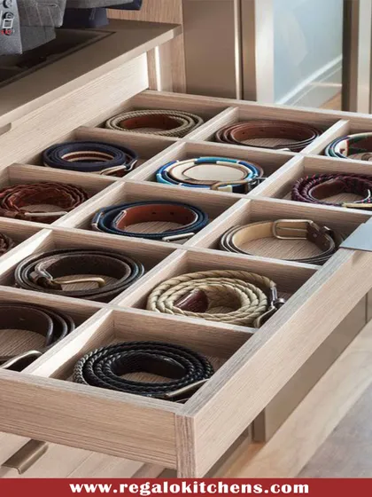 A simple yet effective solution for belt storage. This compartmentalized drawer keeps belts coiled and easy to find, preventing tangles and damage.