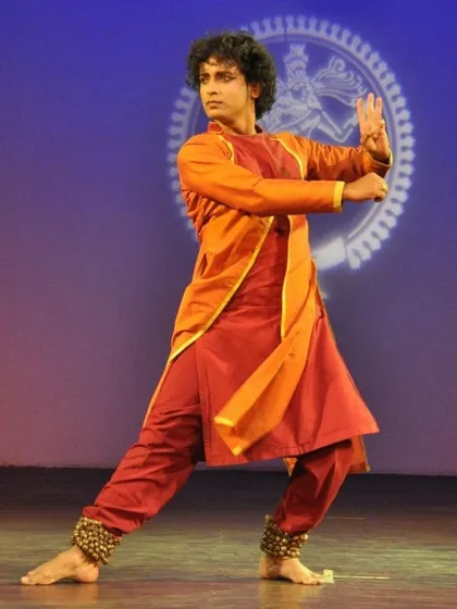 A male dancer performing Bharatanatyam, showcasing the strength and precision the form demands. Our classes are open to all, and we are proud to train both male and female dancers.