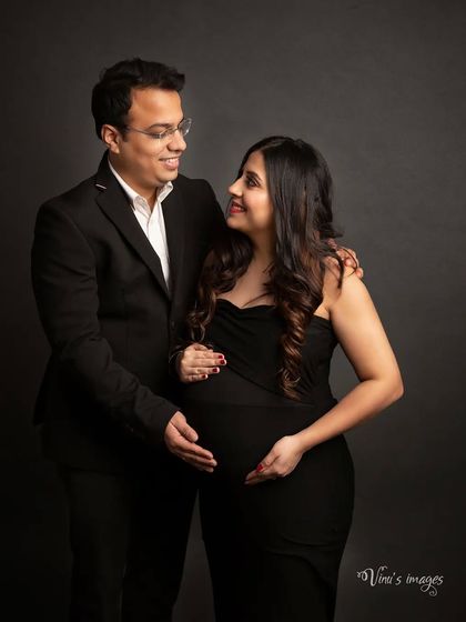 A beautiful portrait of the parents-to-be. Their loving gaze and gentle embrace show the strong partnership at the heart of their growing family.