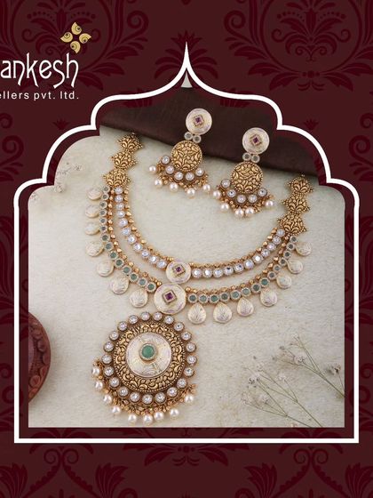 This layered necklace set features coin-like motifs and a central Kundan pendant, framed by pearls. It's a design that bridges the gap between past and present, perfect for modern tastes.