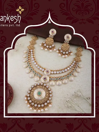 This layered necklace set features coin-like motifs and a central Kundan pendant, framed by pearls. It's a design that bridges the gap between past and present, perfect for modern tastes.