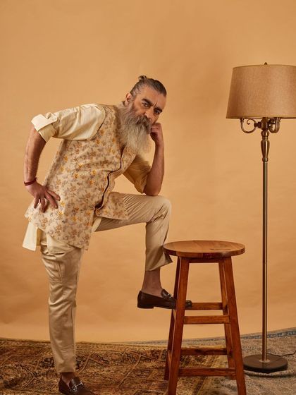 Style knows no age. Our floral vest and kurta set, worn with confidence and grace, proves that timeless elegance is for everyone.