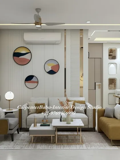 A bright and airy living room with a comfortable chaise lounge. The circular wall art and mix of cushions add a playful yet sophisticated touch to the modern Indian design.