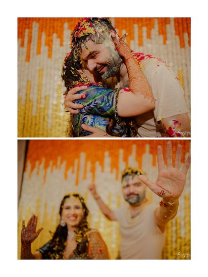 A playful hug and a wave to the camera, capturing the fun-loving spirit of the couple's Haldi.