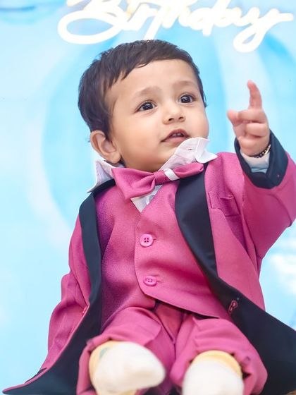 A playful 'Construction' themed birthday party, with yellow and black decor, construction vehicle cutouts, and hard hat props, perfect for little builders.