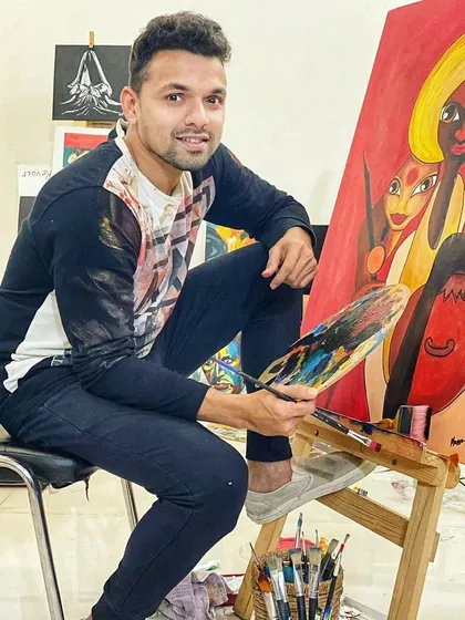 Here I am in my element, working on a large canvas. The process of developing an idea with passion, from a blank slate to a finished piece, is a journey I love sharing with my clients.