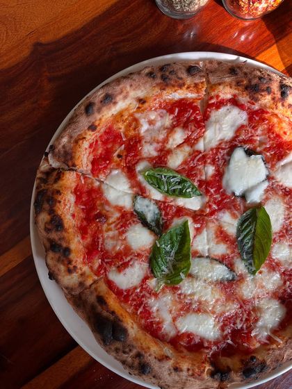 Pizza the way it was meant to be. No frills, just flavours. Our Margherita is a perfect example.