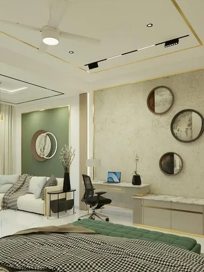 A perspective from the bed, looking towards the sitting area and the large window.