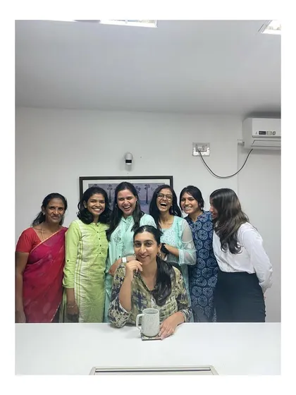 A candid moment with the ladies of A&Y and a wonderful batch of interns.