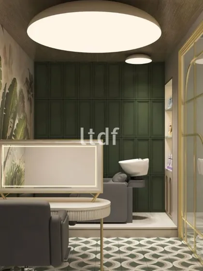The design in this salon speaks in contrasts: structured patterns against organic calm, glowing warmth against deep surfaces. Every detail, from the patterned floor to the botanical wallpaper, is composed to balance indulgence with intention, making beauty an immersive experience.