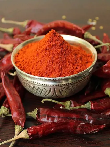 This is the heart of Andhra spice, my Guntur Red Chilli powder. The chillies come from our own farm, so they are completely chemical-free and full of natural, fiery flavor. I can adjust the spice level for you on request.