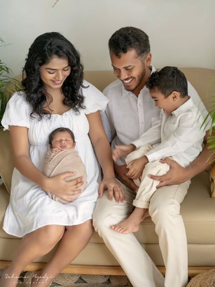 A beautiful family of four, full of joy and love. These are the moments that you'll look back on and smile, remembering the happy chaos of life with little ones.