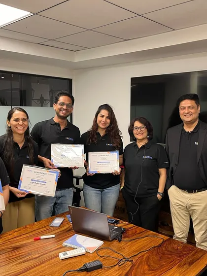 A group photo with fellow trainers at the end of a productive workshop. Collaborating with other experts in the field is always an inspiring experience.