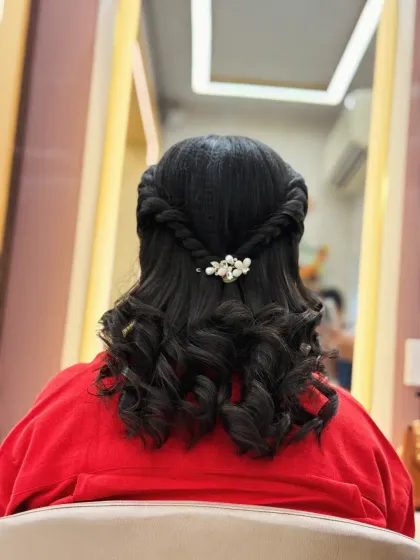 A view from the salon chair of this lovely twisted hairstyle. It's a versatile look that can be dressed up or down.