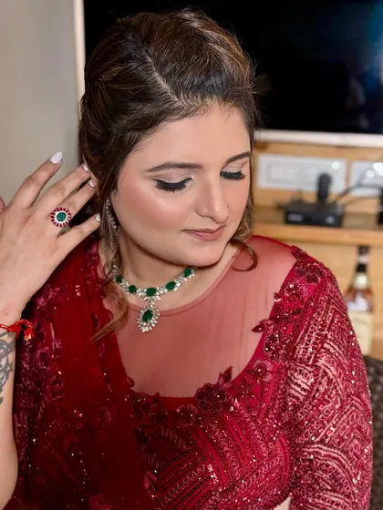 An eyes-closed shot to showcase the soft, blended eyeshadow and the overall radiance of the skin. A perfect look for a cocktail or reception event.