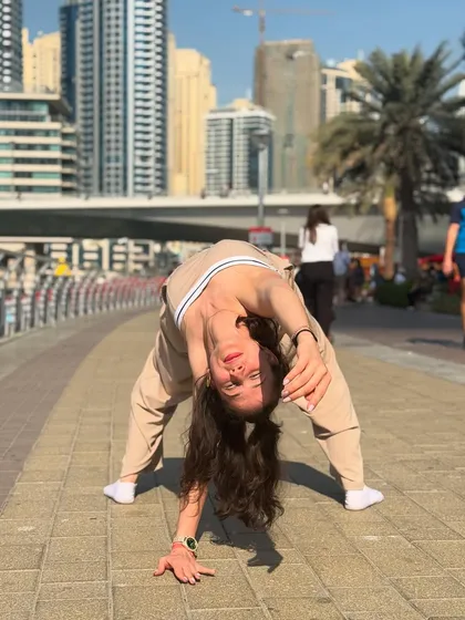 Staying flexible in life and in dance. A deep forward bend pose captured during my trip to Dubai.