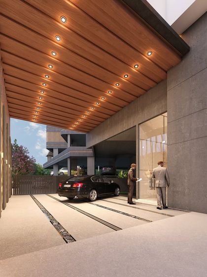 The covered drop-off and entrance area of the AURA Sky Tower. We designed this space for a seamless and impressive arrival experience, featuring a warm wood-paneled ceiling, integrated lighting, and direct access to the main lobby.