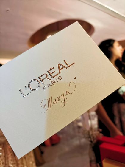A close-up of the personalized card I created for Navya Nanda at the L'Oréal event. The simple elegance of calligraphy adds a layer of luxury and thoughtfulness to the brand's gift.