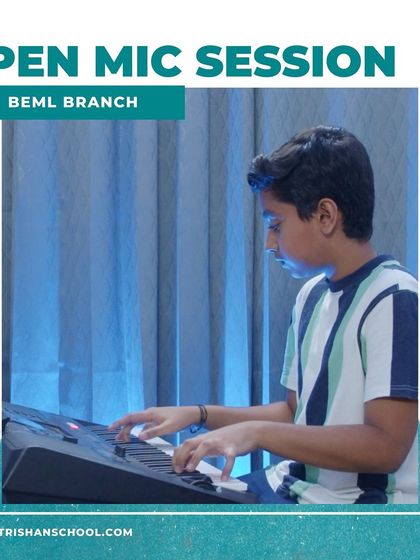 A student plays the keyboard at our BEML branch open mic session.