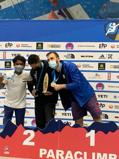 Sharing the podium with other incredible athletes in Los Angeles. The camaraderie in the international para-climbing community is truly special.