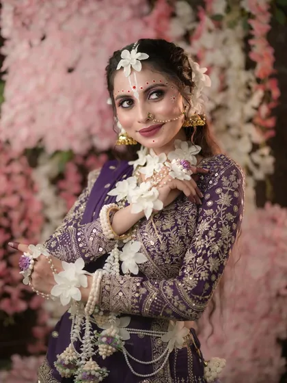 A portrait capturing the gentle and devotional expression of Radha.