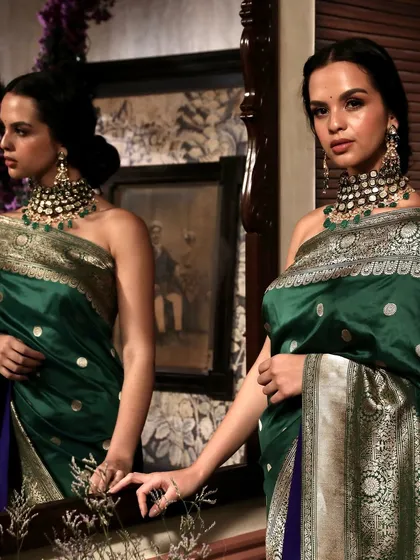 Using mirrors and reflections to create a dynamic and captivating image for a luxury saree brand. This technique adds depth and an editorial feel to the photoshoot, perfect for high-end fashion campaigns.