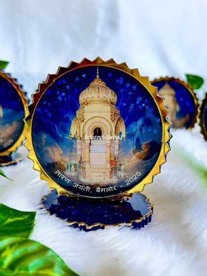 A beautiful custom souvenir created for the Taran Jayanti festival in Bengaluru. The design reflects purity and tradition, with a deep blue background and a high-shine, scalloped gold border.