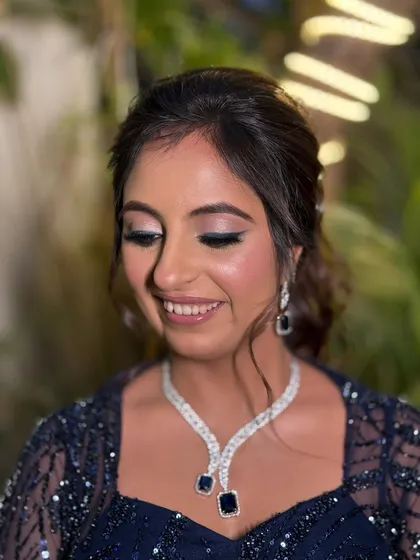 A close-up of the soft smokey eye with a silver-blue shimmer. It’s a modern take on a classic look.