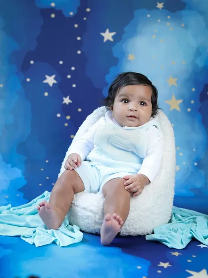Twinkle, twinkle, little star. This sweet baby looks right at home in our starry night themed setup. So dreamy!