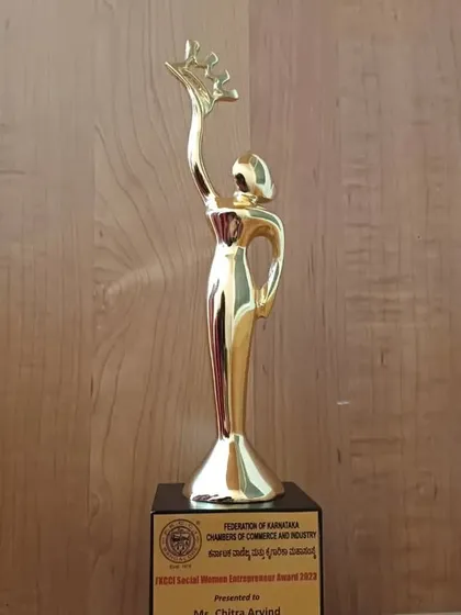 A close-up of the Social Woman Entrepreneur Award trophy. This recognition fuels my passion for sharing the benefits of movement with a wider community.