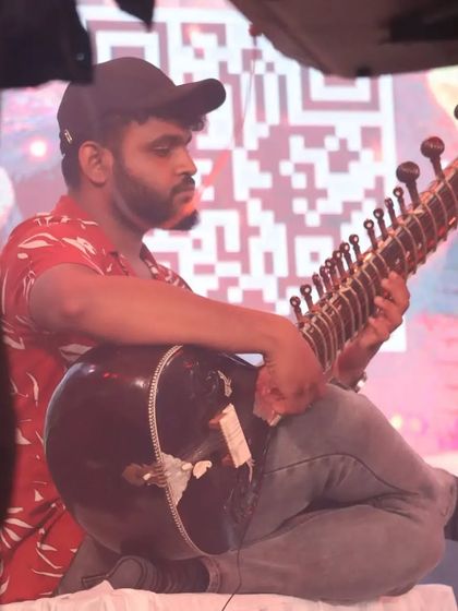 Another angle from a fusion show, showing the scale of the stage. I enjoy the challenge of making the sitar stand out in a loud, dynamic band setting.