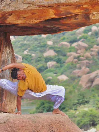 Your body has the ability to surprise you by breaking its own limitations. Here, I am exploring an advanced asana against the unique rock formations of Hampi, preparing my body to go beyond what I thought was possible.