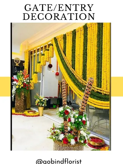 Here is an example of a home entrance decoration for a wedding event. I used curtains of yellow and green marigold strings to frame the doorway, making it festive and welcoming for guests.