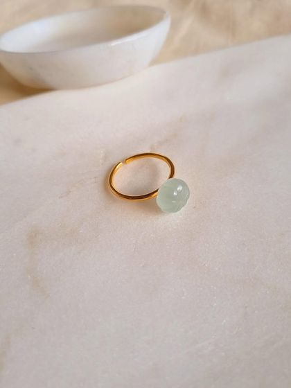 The Aquamarine Melon Ring, with its special cut, is a beautiful way to carry the calming energy of this stone.