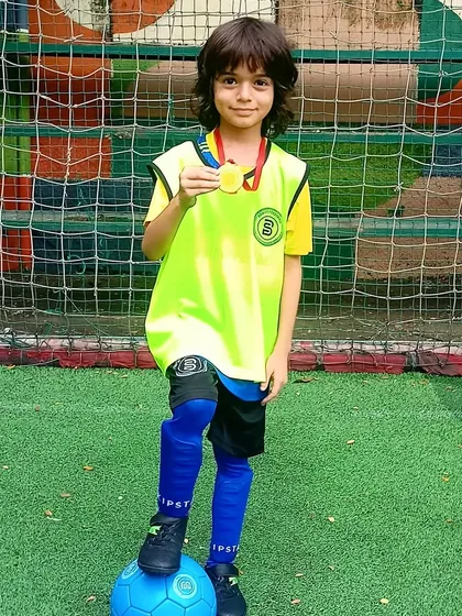 This young player's skill and positive attitude earned him a Player of the Month award.