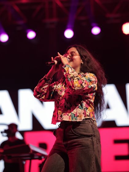 Another shot from the Ahmedabad concert, feeling the rhythm and connecting with the band. The synergy between us on stage is what makes the music come alive.