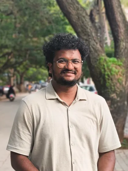 This is me, Sharan, the artist behind the murals. Every line is painted by hand, and I work with you directly to bring your story to your wall.