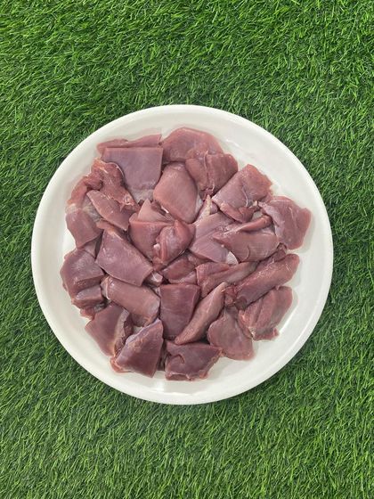 This image showcases the rich color and texture of my boneless turkey breast, perfect for adding high-quality protein to your dog's diet.