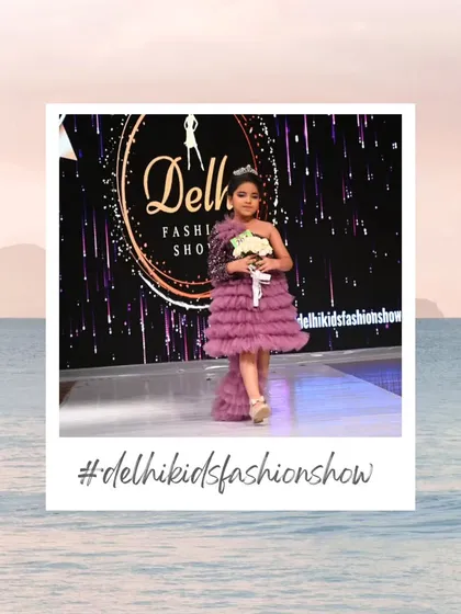 Walking with grace and a lovely bouquet, this participant looks picture-perfect in her tiered purple dress and tiara. It’s a snapshot of the magical experience I create for every child.