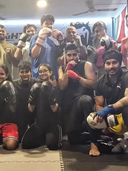 The combined batch after a great session. The energy and camaraderie in these classes are what makes our gym a true family.