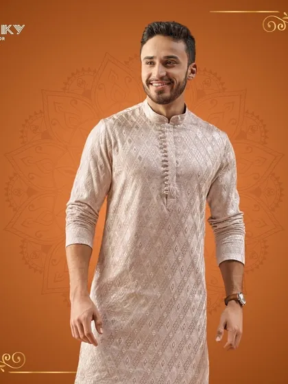 Celebrate Diwali in style with this intricately designed embroidered kurta. The subtle texture and elegant pattern add a refined touch to your festive wardrobe.