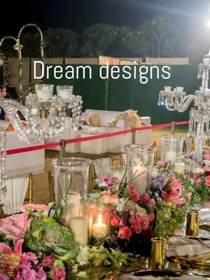 Luxury is in the details. This long dining table showcases my approach to opulent table settings, featuring lush floral runners and magnificent crystal candelabras that reflect the light and create an atmosphere of pure sophistication.