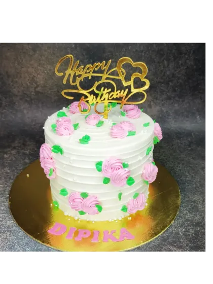 A floral cake with a coffee twist. This chocolate coffee mousse cake is decorated with rustic pink flowers, perfect for a birthday.