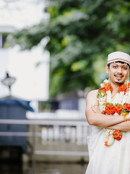 A relaxed portrait of the couple shortly after their wedding ceremony, capturing the happy and confident start to their new journey together.