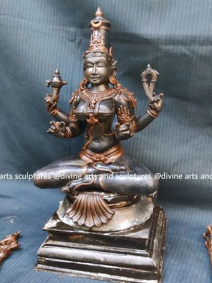 The wax model of Kamakshi, a form of the divine mother. The sculpture is shown here with its arms detached, a part of the intricate process of casting multi-limbed deities.