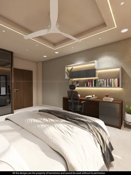 This guest bedroom features a floating study desk with open shelving, providing a functional workspace without cluttering the room.